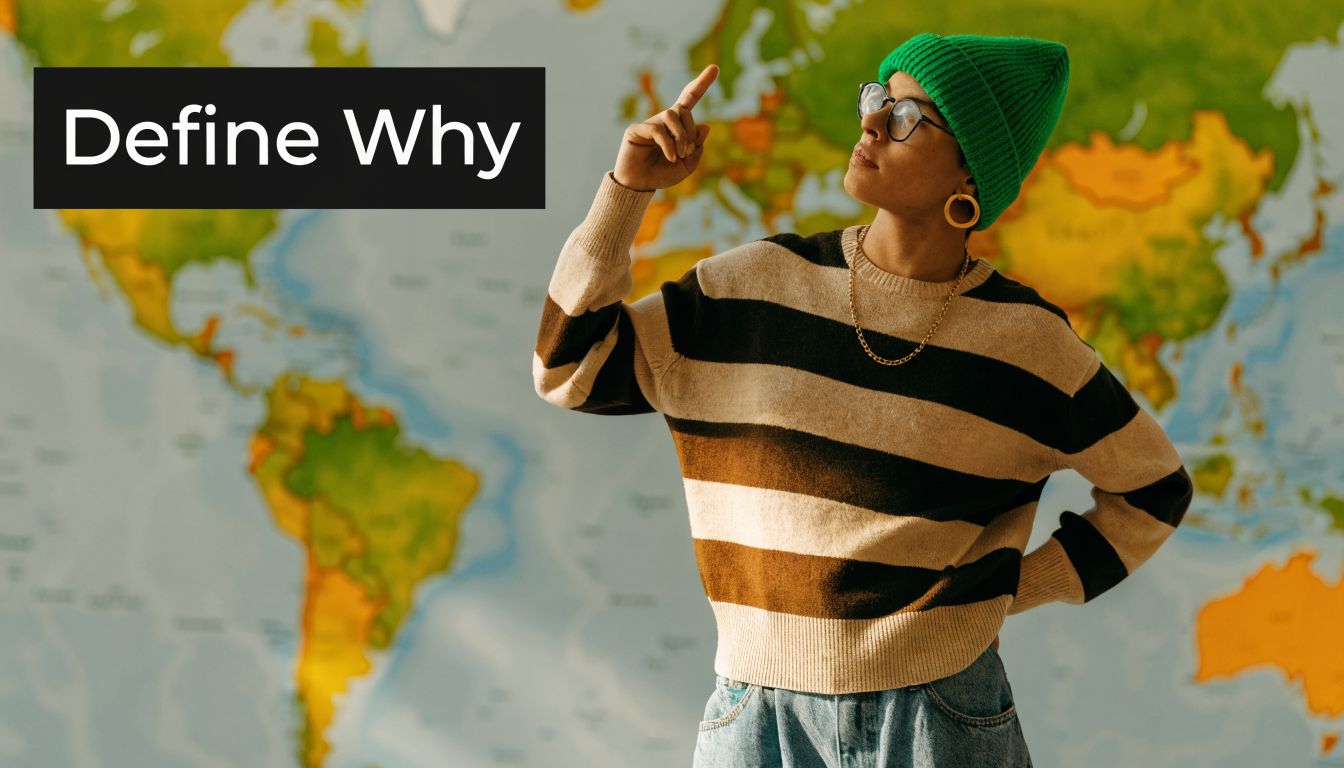 A person wearing a green beanie points to a blurred world map background with a thoughtful expression.