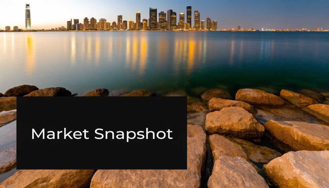 A scenic view of a modern city skyline reflecting over the calm water at dusk.